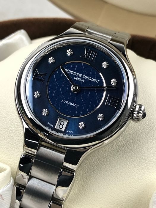 FC-306NHD3ER6B שעון יוקרתי לנשים של פרדריק קונסטנט שוויץ | שעון אוטומטי כסוף בלוח כחול פנינה משובץ | שעוני יוקרה לאישה | יבואן רשמי Frederique Constant Geneve Delight Automatic Ladies FC-306NHD3ER6B