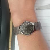 233XSSTM שעון יד סגאגן לנשים | דגם אפור בלוח משובץ 12 זרקונים | רצועת רשת אופנתית | חנות שעונים בראששון לציון | Grey Dial Gunmetal Ion-plated Ladies Watch 233XSSTM by Skagen