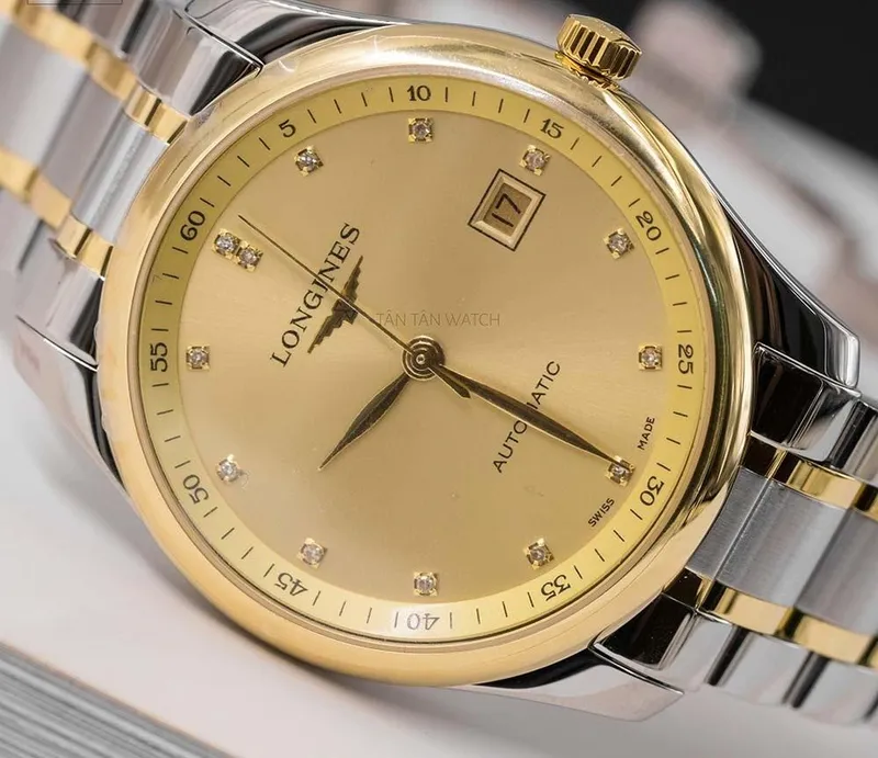 L2.893.5.37.7 שעון יוקרה של לונג';ן מסדרת מאסטר קולקשיין היוקרתית | דגם לגברים מנגנון אוטומטי גב שקוף לוח זהב משובץ באזל ורצועה זהב 18K | שנתיים אחריות | Master Automatic Diamond Two-Tone 18K L28935377