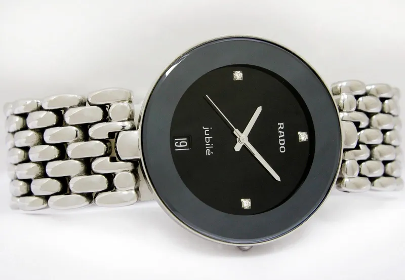 R-37924072 שעון ראדו יבואן רשמי מסדרת פלורנס משובץ 3 יהלומים | הדגם הגדול 35 מ';';מ | 5 שנים אחריות | רתועת פלדת אל חלד | RADO Florence Quartz Date Diamond Dial Men';s Watch R48792723