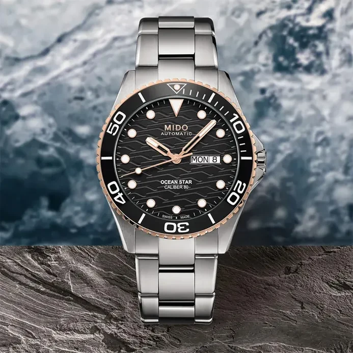 M0424302105100 שעון מידו מסדרת אושן סטאר החדשה לגברים | דגם אוטומטי 80 שעות עם באזל קרמי רוז גולד | לוח שחור מושלם | שנתיים אחריות יבואן רשמי | MIDO Ocean Star 42.5mm Black & Rose M042.430.21.051.00