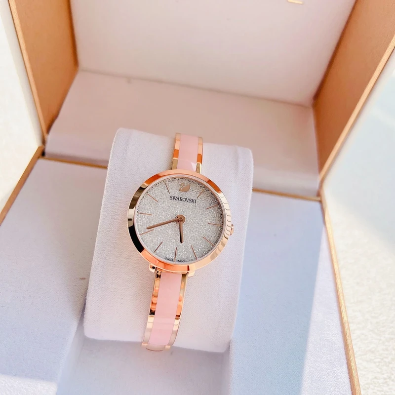 5642221 שעון יד סברובסקי לאישה | דגם צמיד אופנתי | דגם צמיד רוז גול משולב צבע ורוד | לוח אבנים מיוחד | שנתיים אחריות | Swarovski Watch Crystalline Delight Rose Gold 5642221