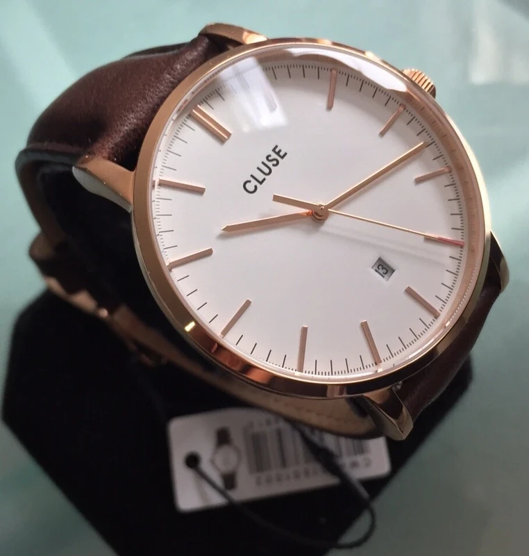 CW0101501002 שעון אלגנטי לגברים של קלוז | דגם רוז גולד ברצועת עור חומה קלאסית | לוח בהיר עם תאריכון | שנתיים אחריות יבואן רשמי | Cluse Brown Aravis Watch CW0101501002