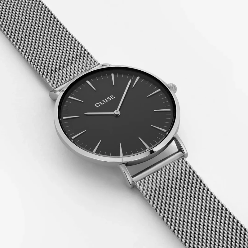 CW0101201004 שעון אופנתי קלאסי ואלגנטי לנשים של קלוז'; | דגם ברצועת רשת כסופה עם לוח שחור | שנתיים אחריות יבואן רשמי | מלאי מוגבל | Cluse Boho Chic 38mm Steel Black Mesh CW0101201004