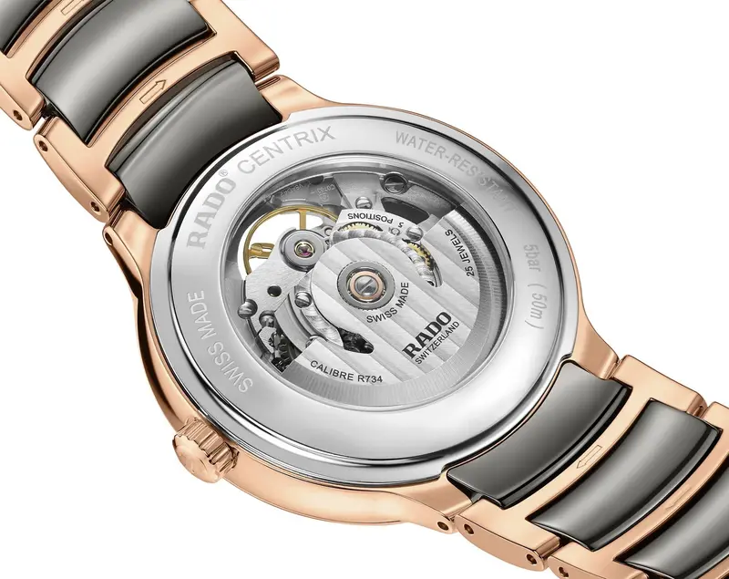 R-60283091 | R30028912 שעון ראדו יבואן רשמי לגברים מסדרת סנטריקס רוז גולד | דגם קרמיקה אוטומטי סקלטון | לוח פנינה משובץ 12 יהלומים | 5 שנים אחריות | Rado Centrix Automatic Diamonds Open Heart R3002891