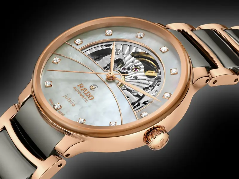 R-60283091 | R30028912 שעון ראדו יבואן רשמי לגברים מסדרת סנטריקס רוז גולד | דגם קרמיקה אוטומטי סקלטון | לוח פנינה משובץ 12 יהלומים | 5 שנים אחריות | Rado Centrix Automatic Diamonds Open Heart R3002891