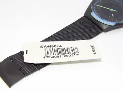 SKW6874 שעון סולארי של סקאגן לגברים | דגם אופנתי בלוח מרשים ומיוחד | רצועת רשת וקייס מושחרים | שנתיים אחריות יבואן רשמי | Skagen Grenen Solar Powered SKW6874 men';s watch