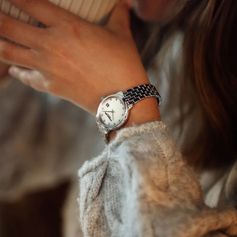 5985-ST-97081 שעון יוקרה לאישה של ריימונד ווייל שוויץ | אחריות יבואן רשמי | לוח פנינה משובץ 11 יהלומים | שעון אלגנטי קלאסי | Toccata Ladies White Mother-of-Pearl Diamond 5985-ST-97081