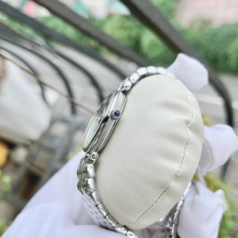 FC- 200KMPW2V6B שעון מיוחד לאישה של פרדריק קונסטנט שווייץ | דגם אובלי בלוח מאד מיוחד פנינה ירוק רומי | מלאי מוגבל | שנתיים אחריות יבואן רשמי | Classics Art Deco Oval FC-200MPW2V6B