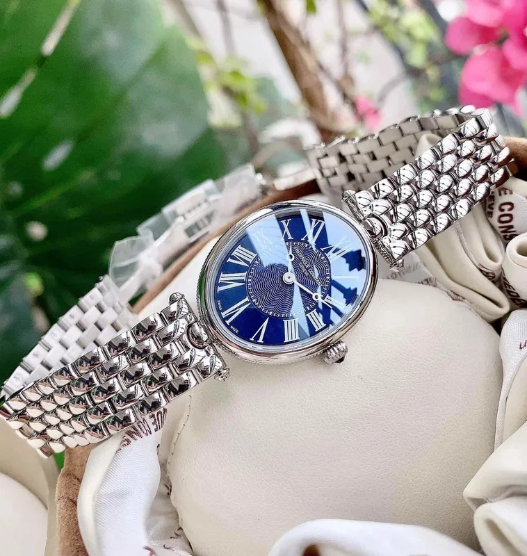 FC-200MPN2V6B שעון יוקרה לנשים של פרדריק קונסטנט | דגם אובלי בלוח פנינה כחול רומי | אבן ספיר בכתר | שעון מיוחד מלאי מוגבל | שנתיים אחריות יבואן רשמי בישראל | FREDERIQUE CONSTANT Art Deco 200MPN2V6B